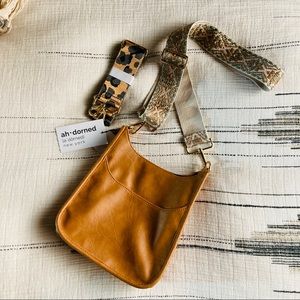 ah-dorned Vegan Leather Crossbody Bag with 2 decorative straps.